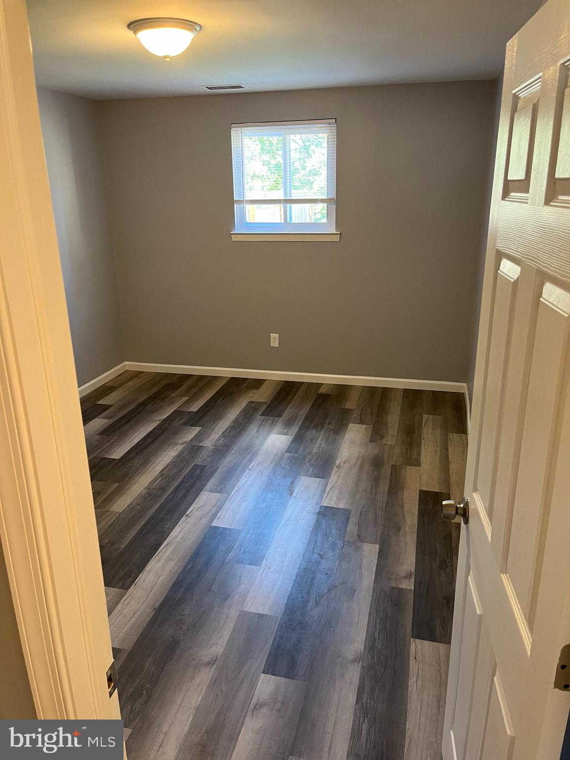 2238 Pileggi Road Warrington, PA 18976 - Photo 7 of 9 a view of an empty room and wooden floor