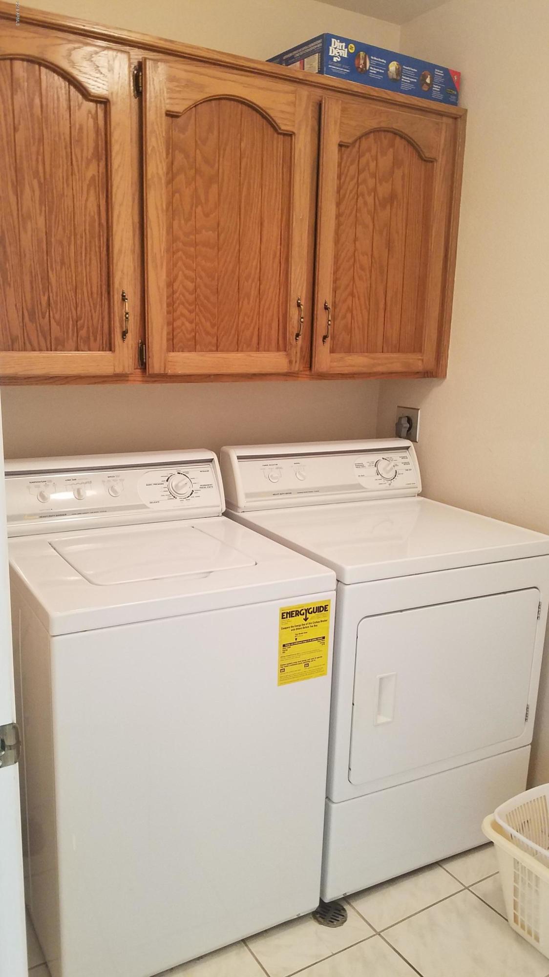 7061 East Broadway Road, Unit 48 Mesa, AZ 85208 - Photo 25 of 41 a utility room with dryer and washer