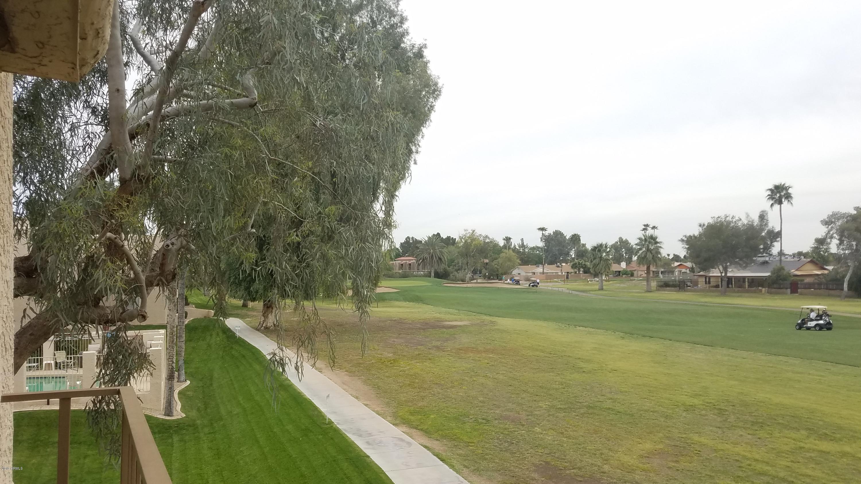 7061 East Broadway Road, Unit 48 Mesa, AZ 85208 - Photo 33 of 41 a view of outdoor space and yard