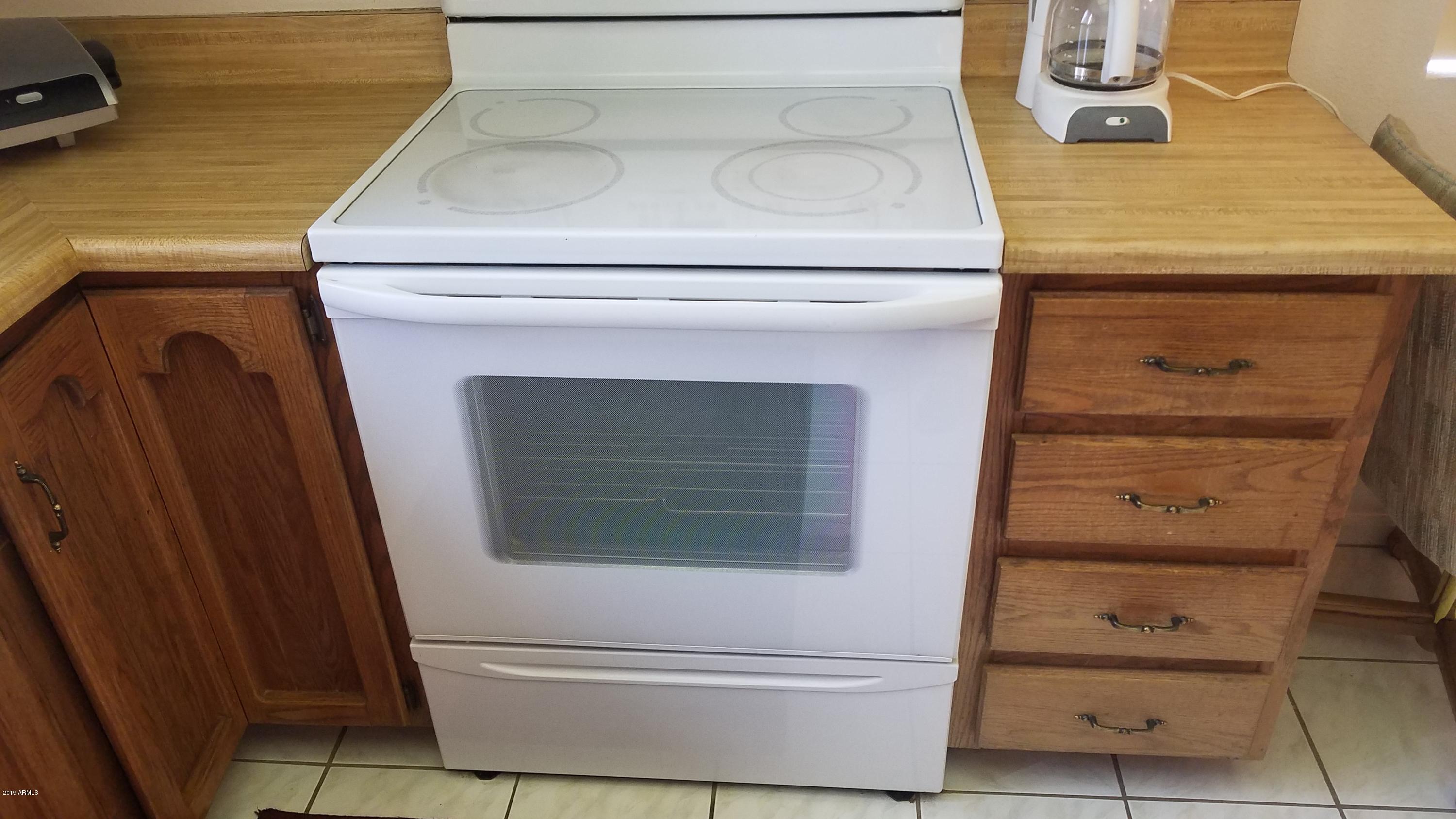7061 East Broadway Road, Unit 48 Mesa, AZ 85208 - Photo 10 of 41 a close view of washer and dryer