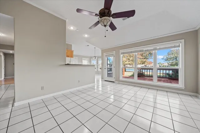 a view of an empty room and window