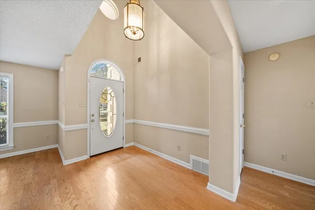 an empty room with windows