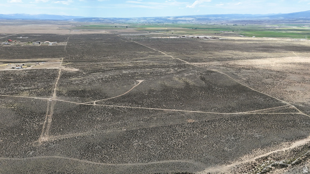 123 East Tbd 5000 Road North Panguitch, UT 84759 - Photo 31 of 54 Expansive arid landscape featuring natural scrub vegetation and visible dirt paths