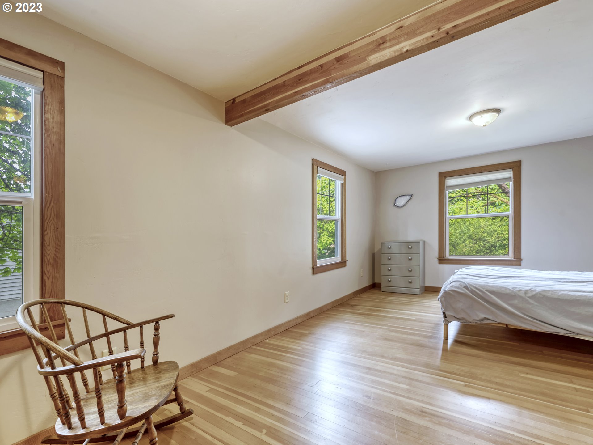 2660 Emerald Street Eugene, OR 97403 - Photo 14 of 36 a bedroom with a bed window and a mirror