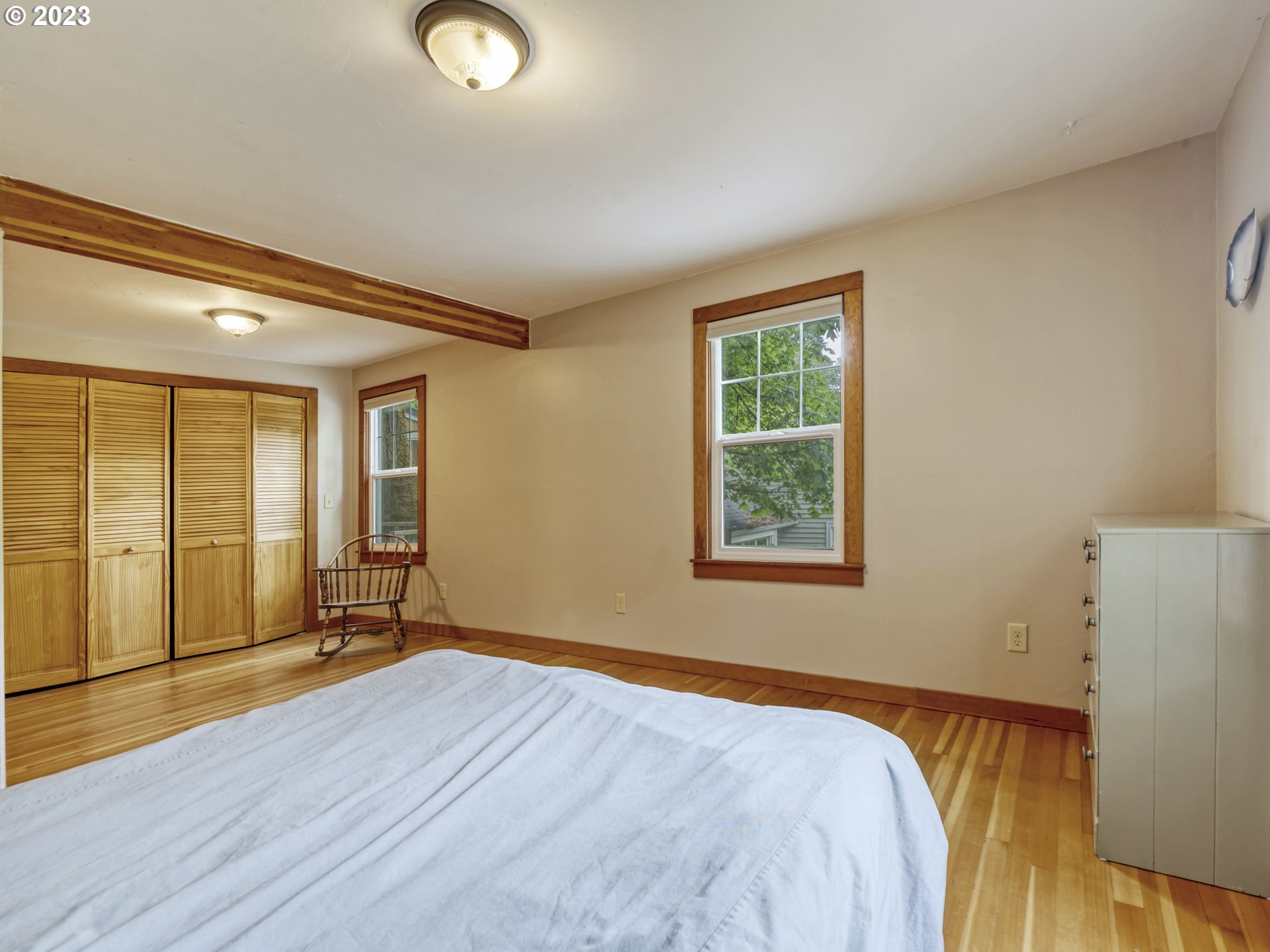 2660 Emerald Street Eugene, OR 97403 - Photo 15 of 36 a bedroom with a bed and a window