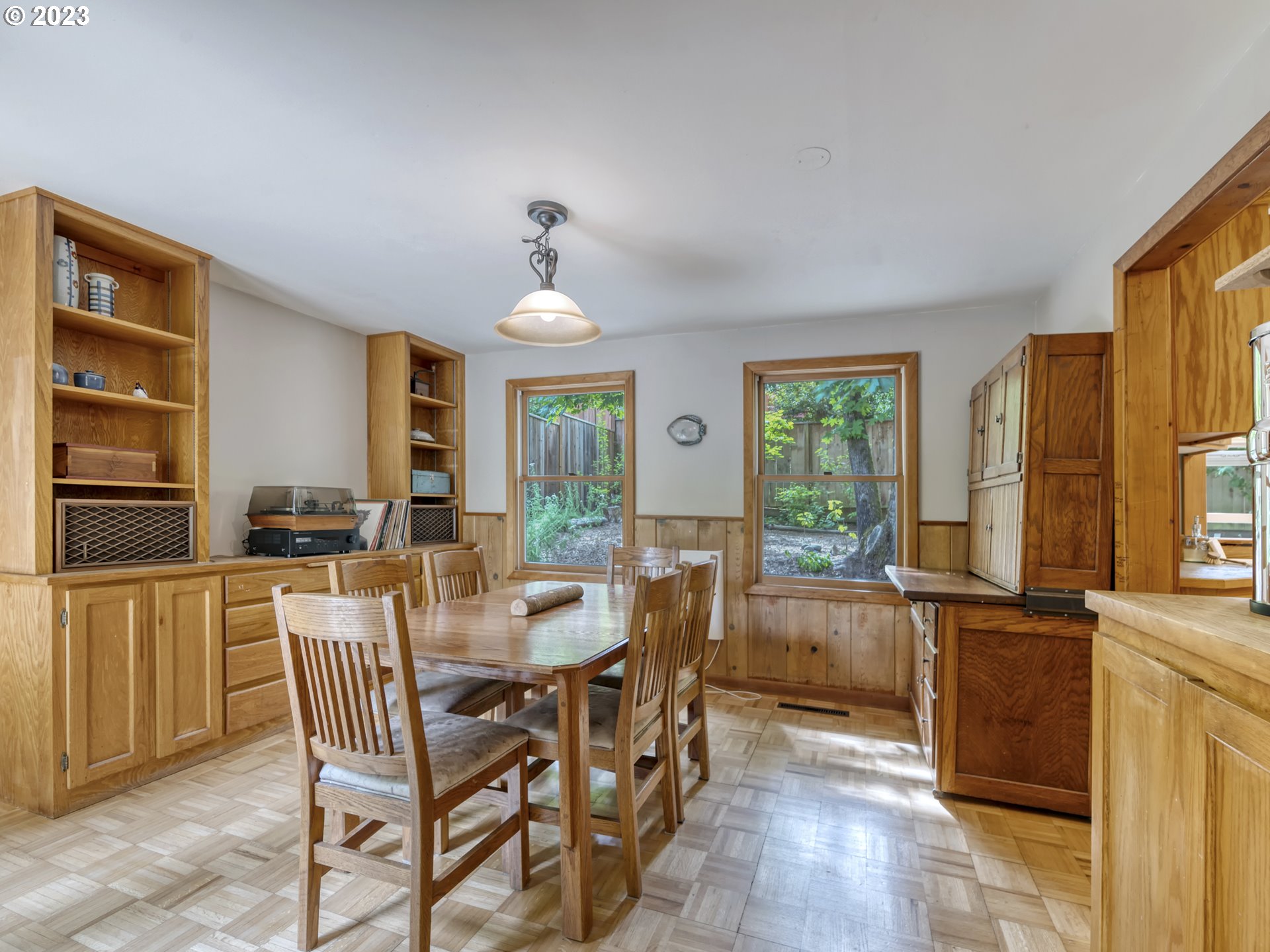 2660 Emerald Street Eugene, OR 97403 - Photo 6 of 36 a view of a dining room with furniture window and outside view