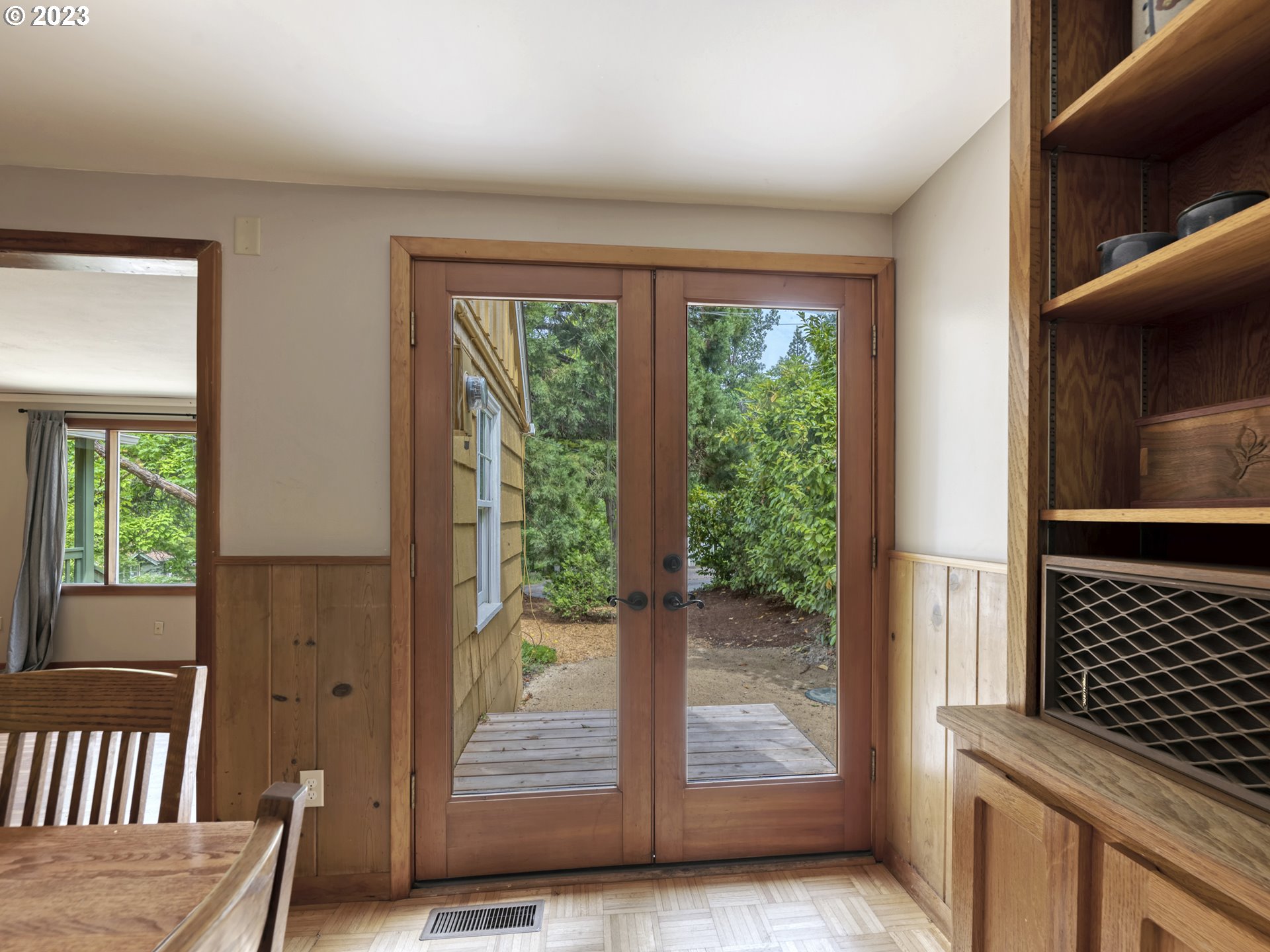 2660 Emerald Street Eugene, OR 97403 - Photo 7 of 36 a view of a porch with wooden floor and outdoor space