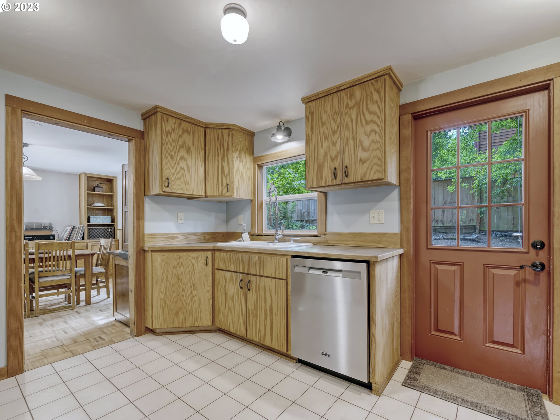 2660 Emerald Street Eugene, OR 97403 - Photo 9 of 36 a kitchen with white cabinets and white appliances