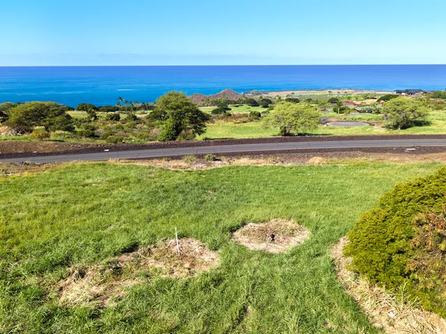 a view of a pool with an ocean view
