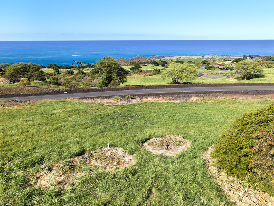 a view of a pool with an ocean view