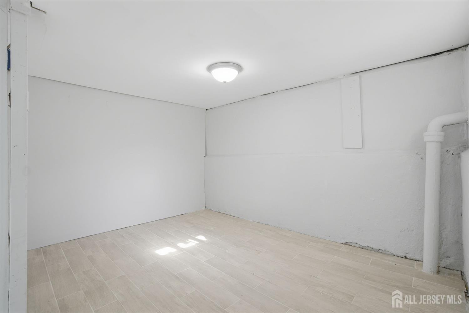 241 Hillside Road Elizabeth, NJ 07208 - Photo 19 of 33 a view of an empty room