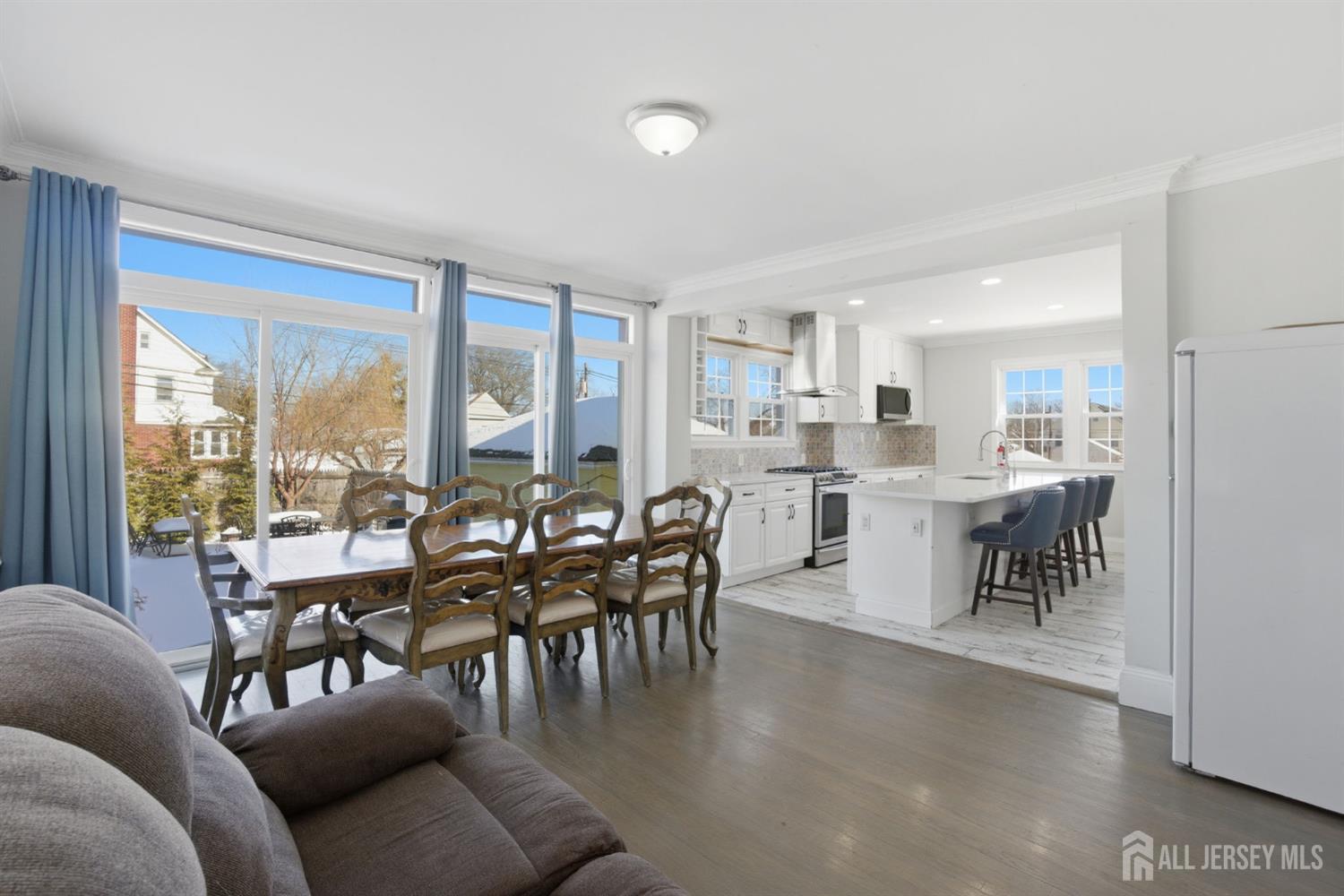 241 Hillside Road Elizabeth, NJ 07208 - Photo 2 of 33 a view of a dining room with furniture window and outside view