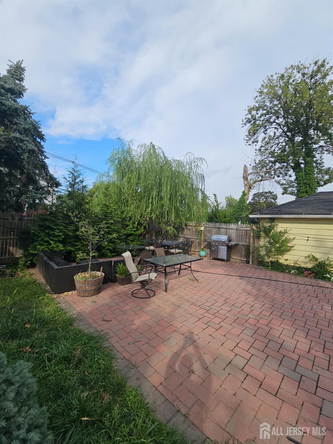 241 Hillside Road Elizabeth, NJ 07208 - Photo 29 of 33 a view of a backyard with sitting area