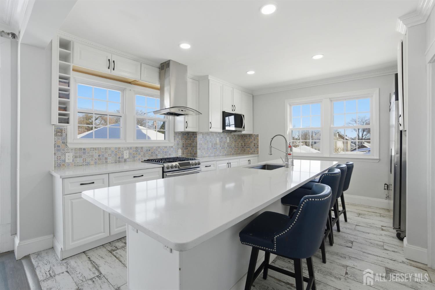 241 Hillside Road Elizabeth, NJ 07208 - Photo 3 of 33 a kitchen with counter top space cabinets and appliances