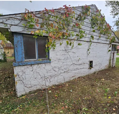 a front view of a house with an outdoor space