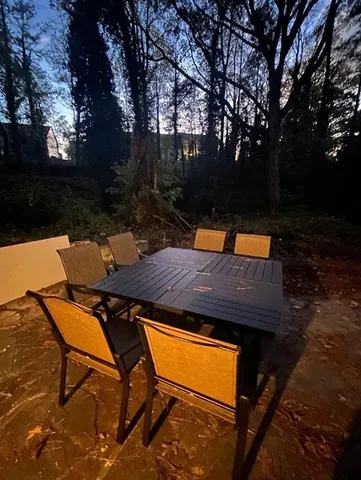 a view of swimming pool with a patio