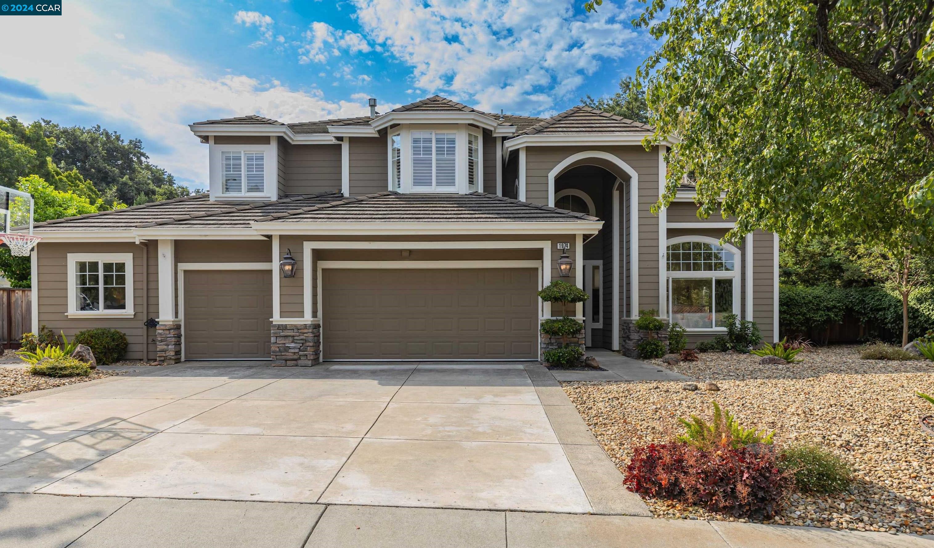 1974 Holly Creek Place Concord, CA 94521 - Photo 1 of 1 a front view of a house with a yard