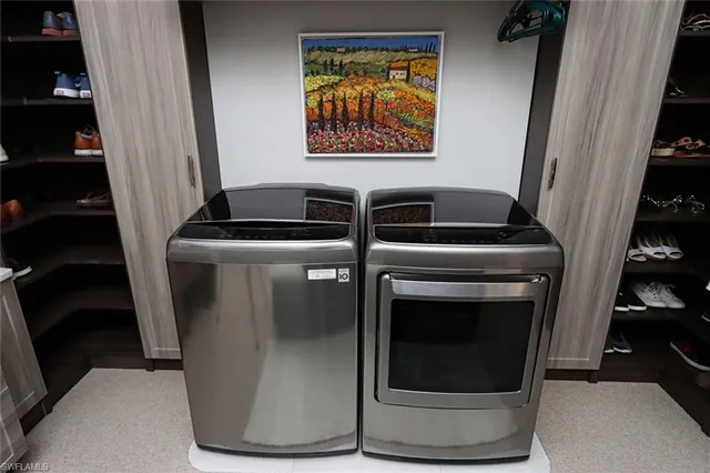 a view of a utility room with washer and dryer