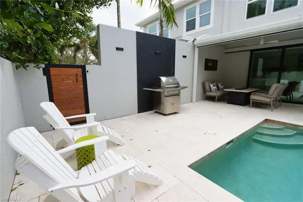 a view of outdoor space with seating area