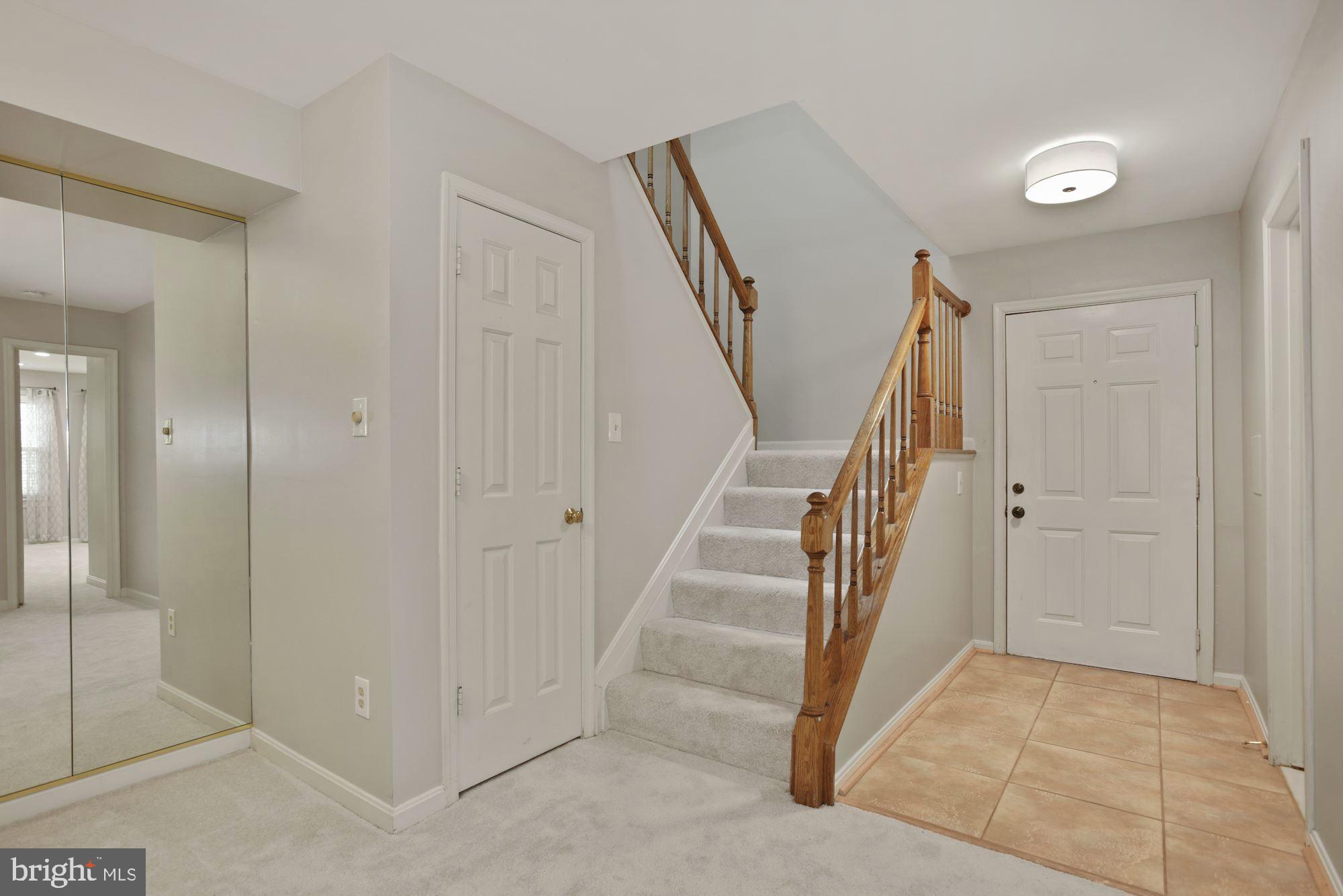 2217 Lovedale Lane, Unit 212A Reston, VA 20191 - Photo 2 of 29 Tiled foyer