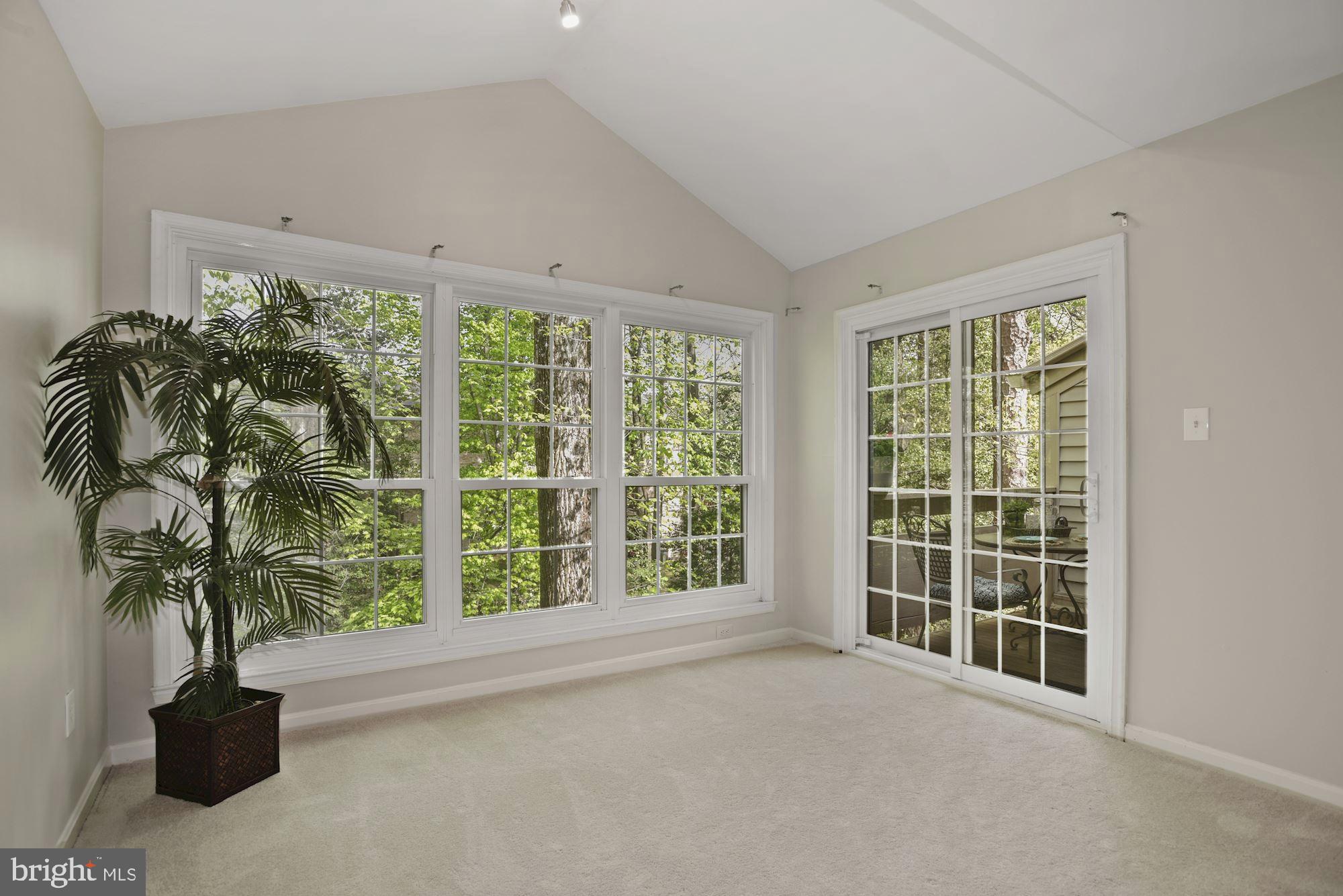 2217 Lovedale Lane, Unit 212A Reston, VA 20191 - Photo 12 of 29 Walkout to balcony from sun-lit sun room