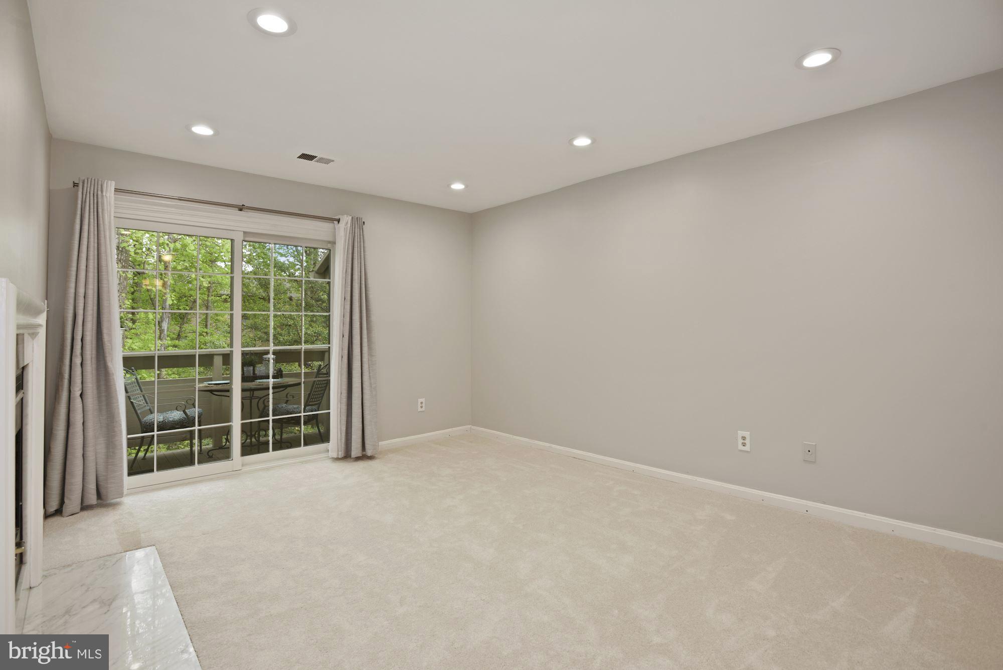 2217 Lovedale Lane, Unit 212A Reston, VA 20191 - Photo 14 of 29 Primary bedroom with balcony access