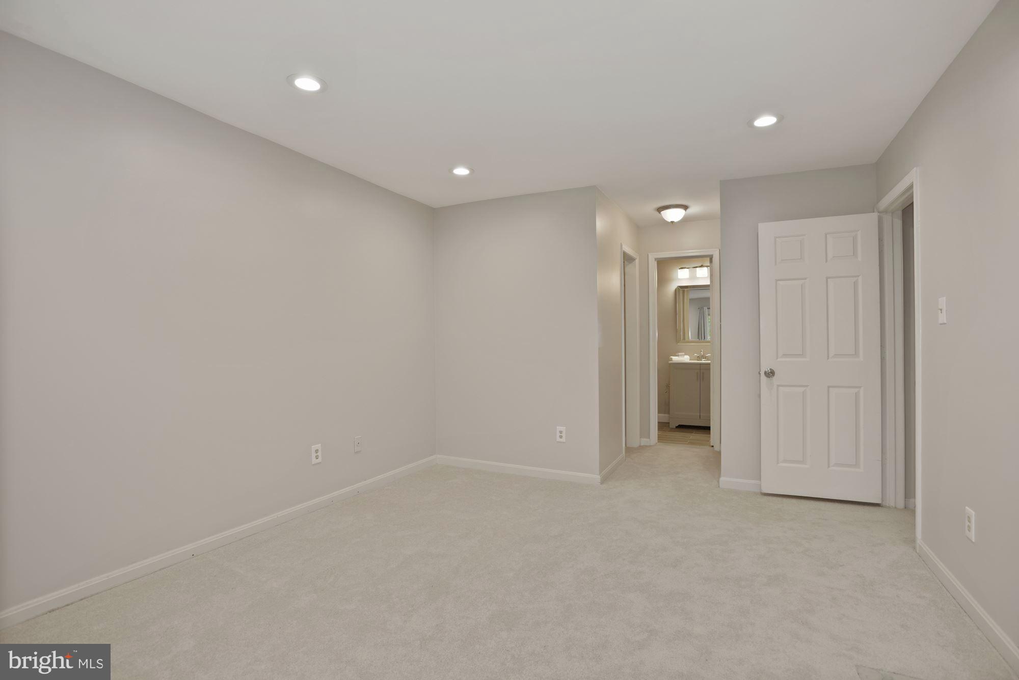 2217 Lovedale Lane, Unit 212A Reston, VA 20191 - Photo 15 of 29 Gorgeous primary bedroom with en-suite bathroom