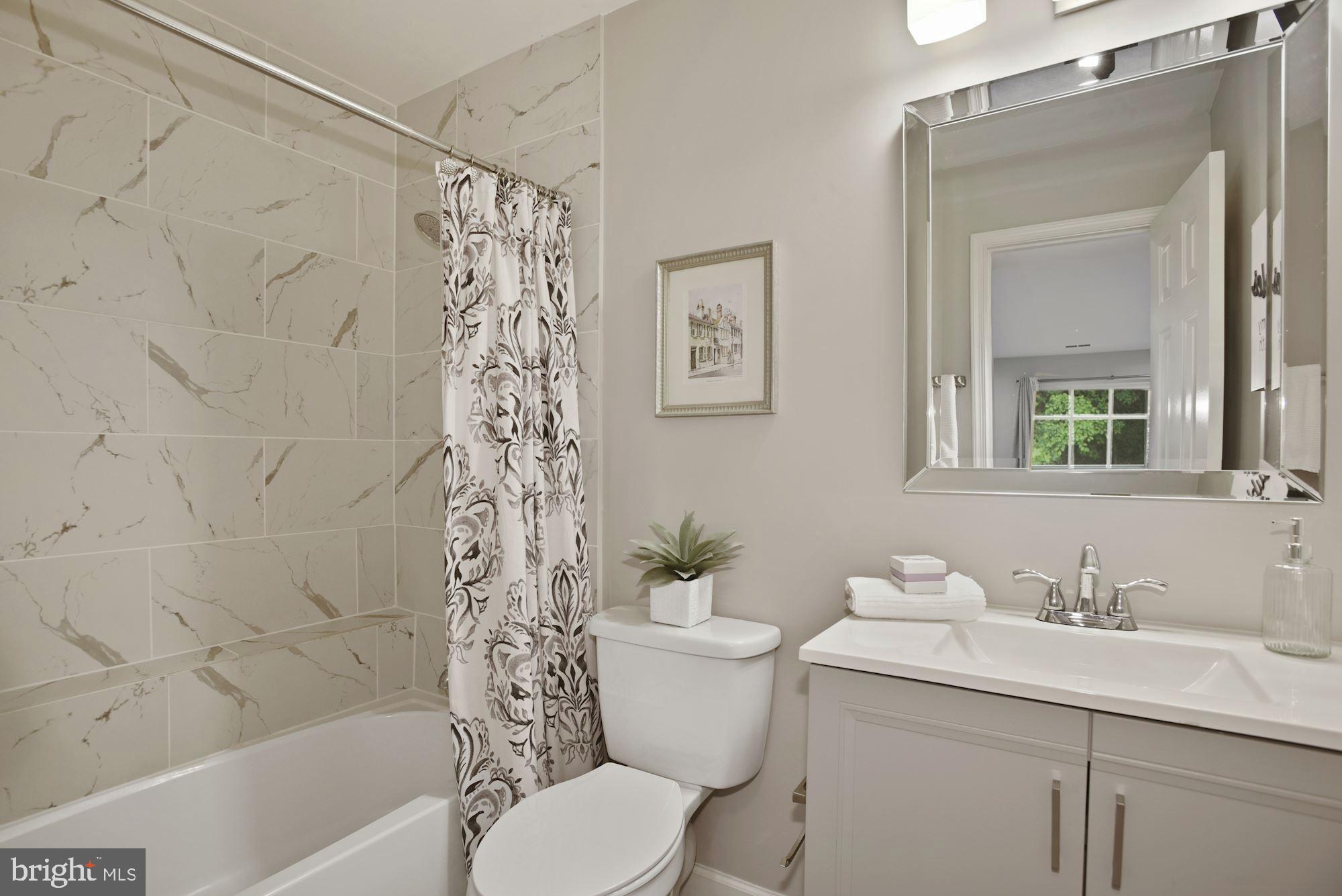 2217 Lovedale Lane, Unit 212A Reston, VA 20191 - Photo 16 of 29 Primary bathroom - Classic renovation