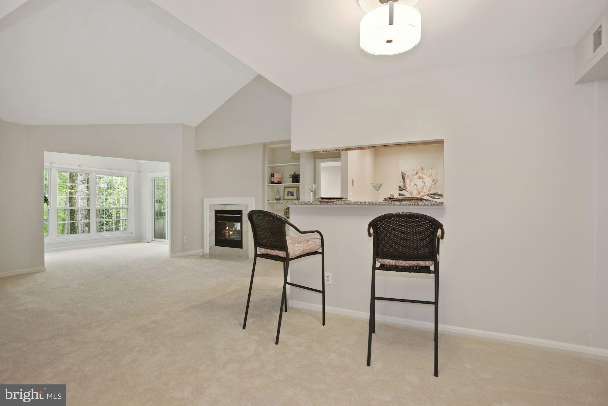 2217 Lovedale Lane, Unit 212A Reston, VA 20191 - Photo 3 of 29 Dining room with counter top bar