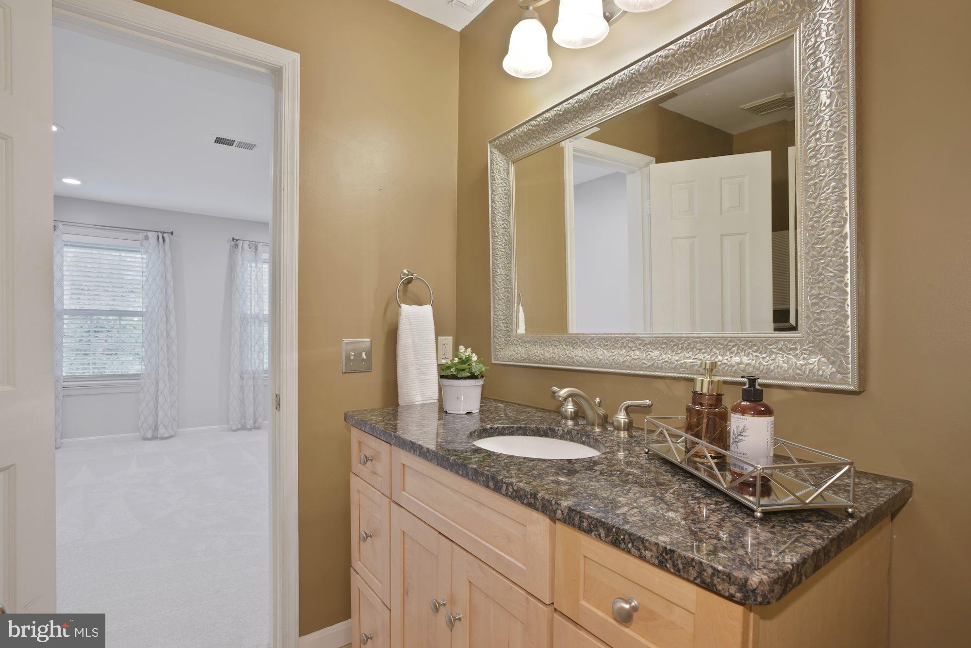 2217 Lovedale Lane, Unit 212A Reston, VA 20191 - Photo 20 of 29 Renovated bathroom off bedroom #2