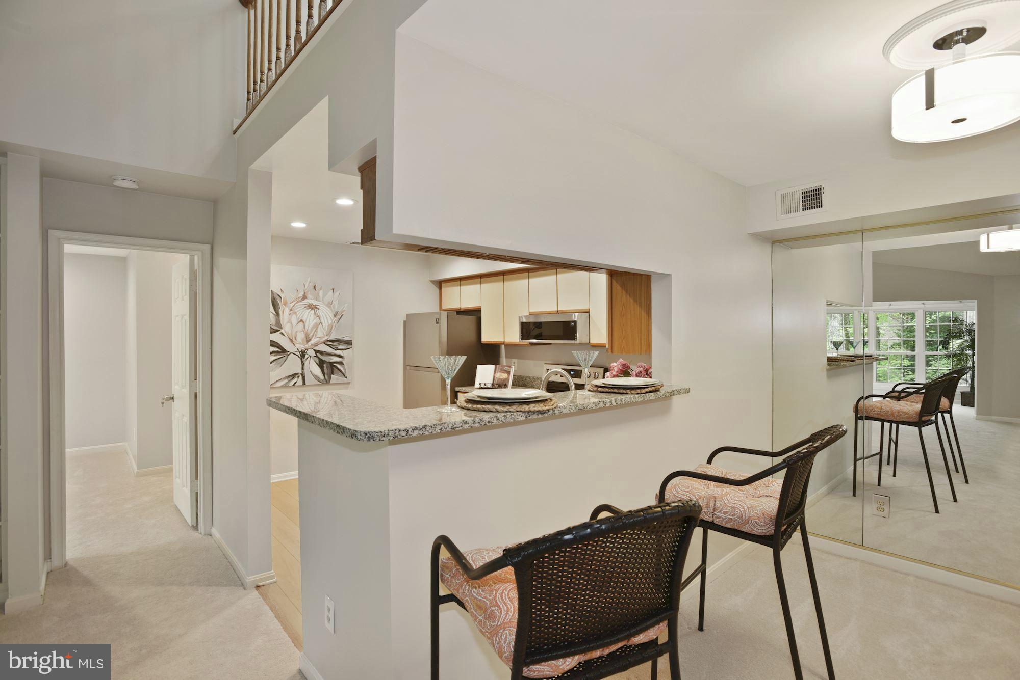 2217 Lovedale Lane, Unit 212A Reston, VA 20191 - Photo 5 of 29 Open kitchen/dining room layout