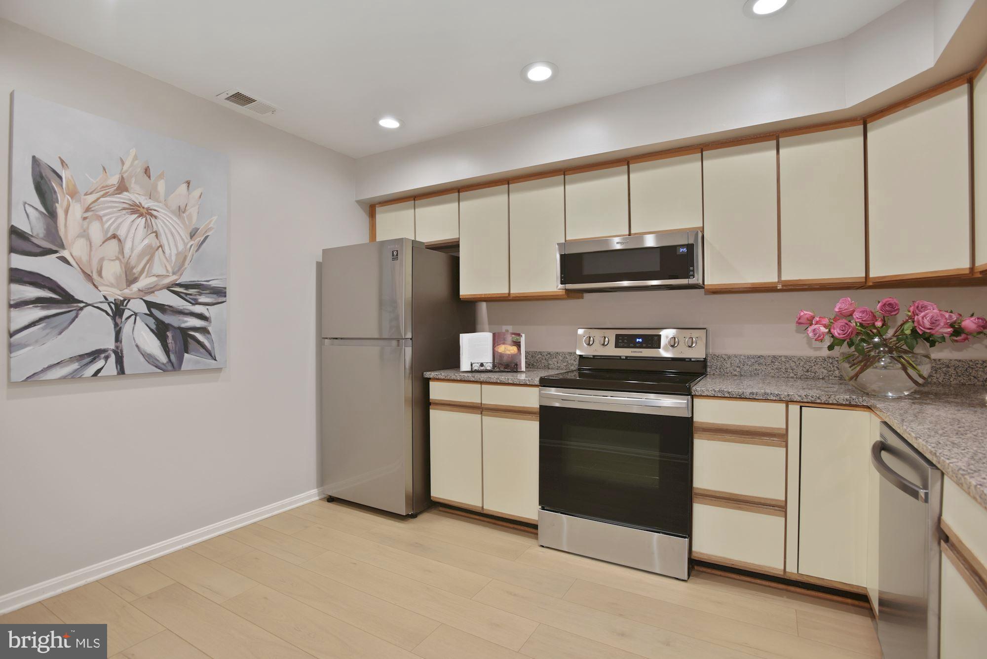 2217 Lovedale Lane, Unit 212A Reston, VA 20191 - Photo 6 of 29 Renovated eat-in kitchen