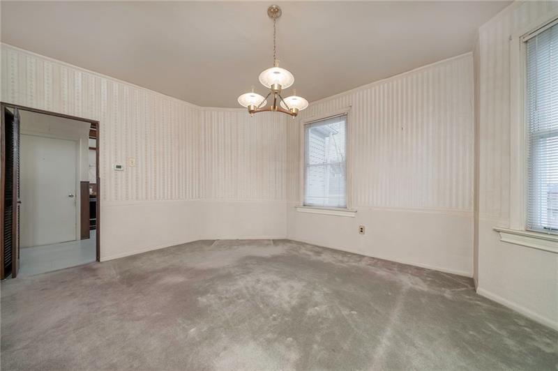 716 Main Street Coraopolis, PA 15108 - Photo 14 of 25 Dining room adjacent to kitchenette area with tall ceilings and plenty of natural light.