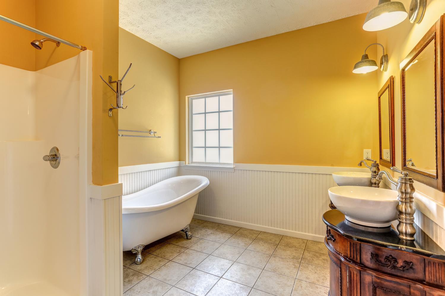 2969 Indian Ridge Boulevard White House, TN 37188 - Photo 19 of 29 a bathroom with a sink and a bathtub