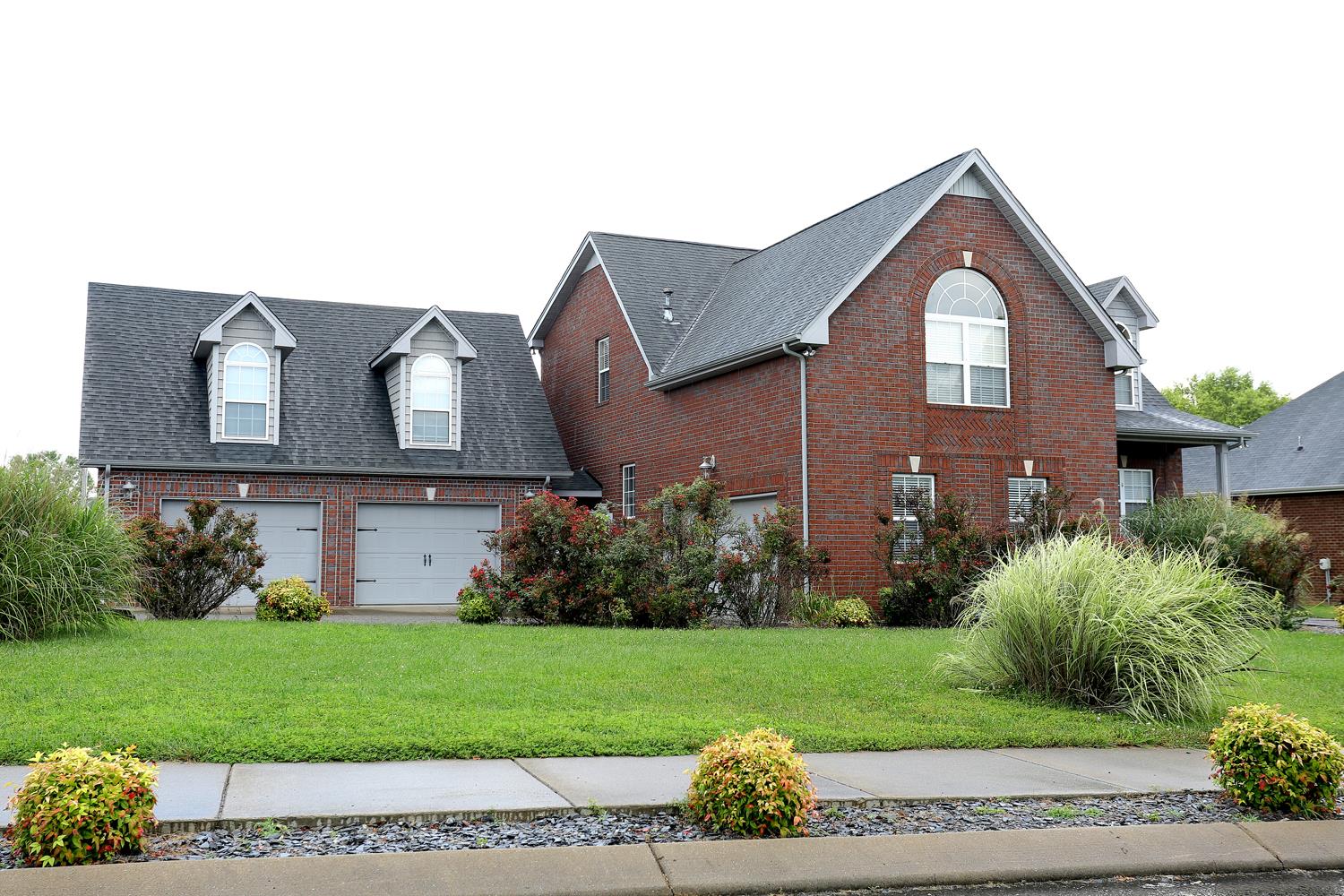 2969 Indian Ridge Boulevard White House, TN 37188 - Photo 2 of 29 a front view of a house with a yard
