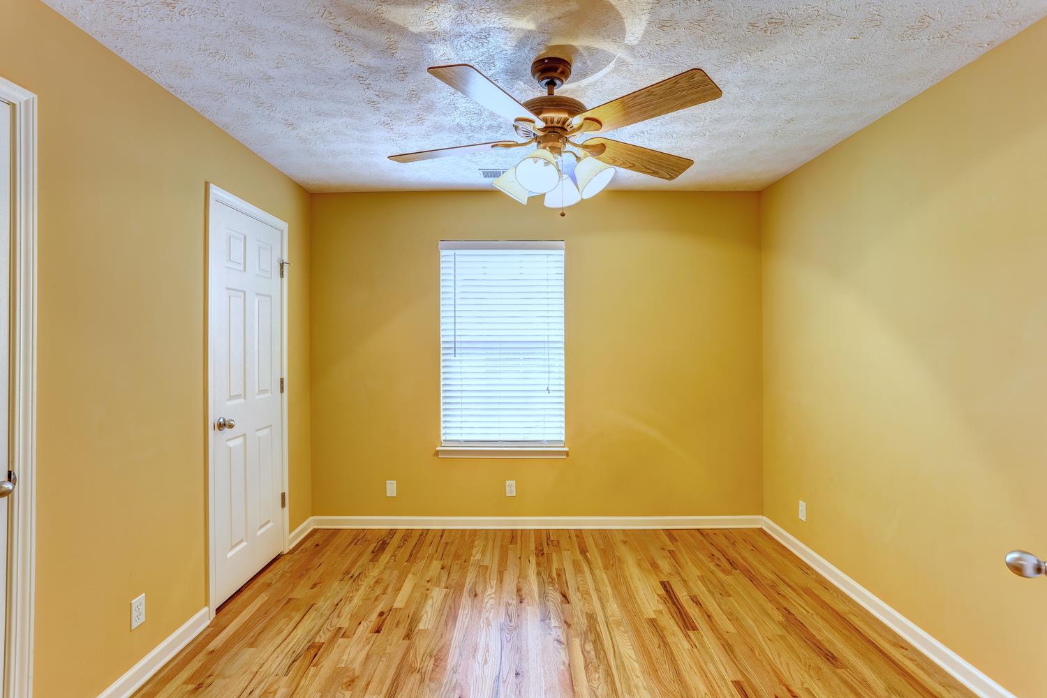 2969 Indian Ridge Boulevard White House, TN 37188 - Photo 25 of 29 a view of an empty room with wooden floor and a window