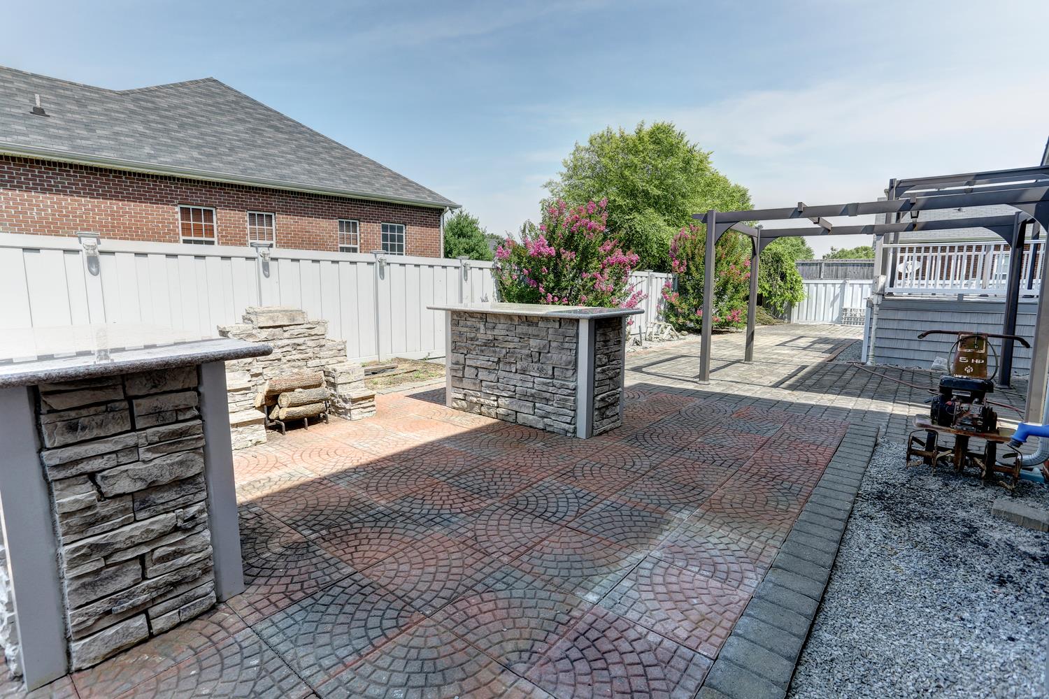 2969 Indian Ridge Boulevard White House, TN 37188 - Photo 28 of 29 a view of a patio with table and chairs and potted plants