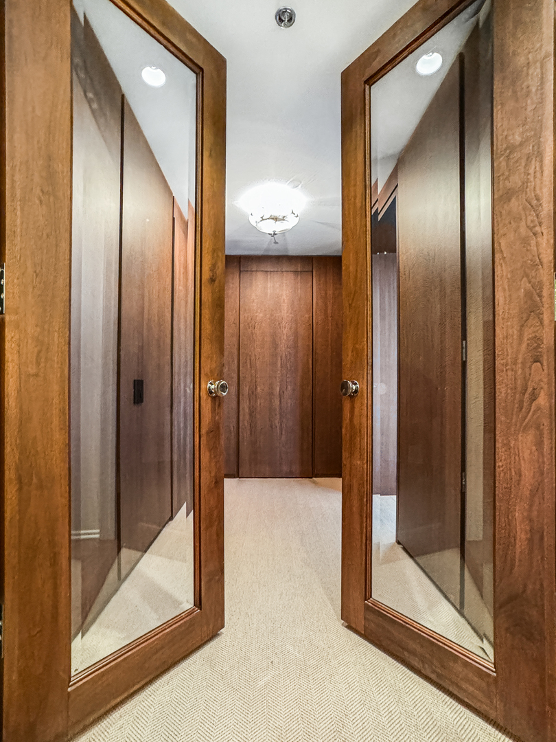 100 East Huron Street, Unit 4002 Chicago, IL 60611 - Photo 25 of 49 a view of a elevator with wooden floor
