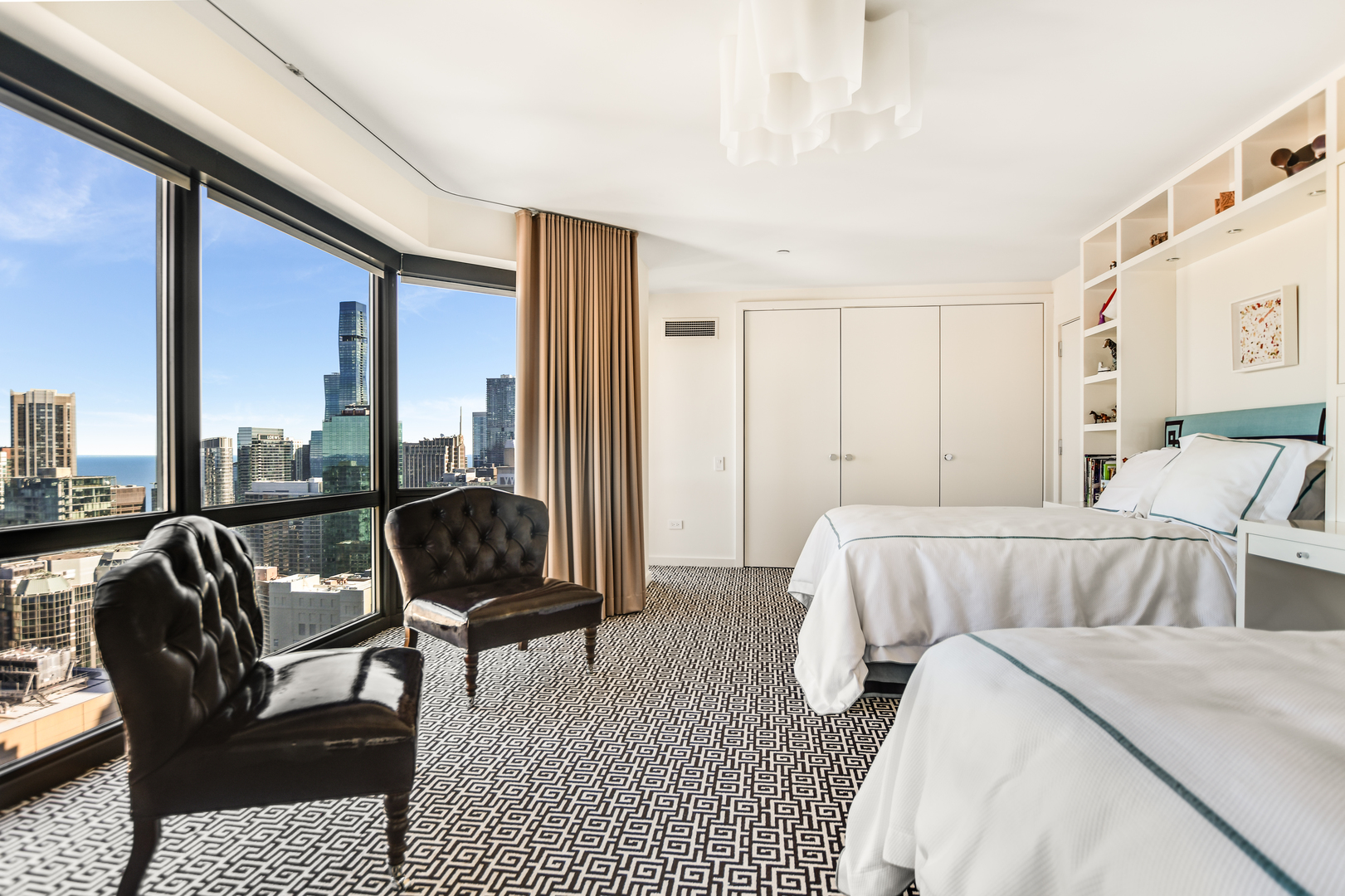 100 East Huron Street, Unit 4002 Chicago, IL 60611 - Photo 33 of 49 a bedroom with furniture and a large window