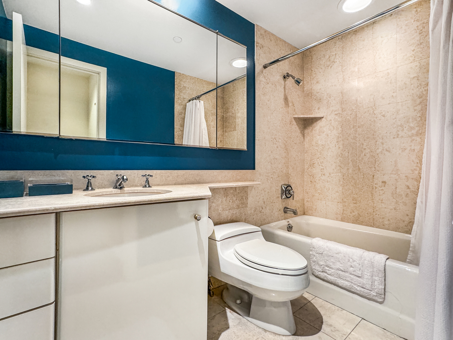 100 East Huron Street, Unit 4002 Chicago, IL 60611 - Photo 36 of 49 a bathroom with a toilet sink and mirror