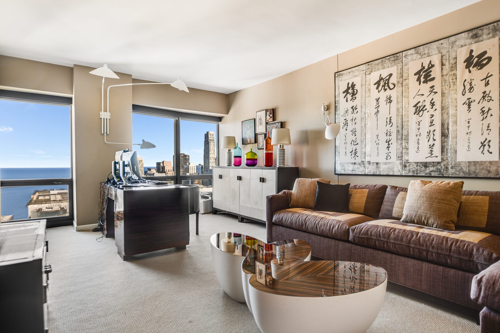 100 East Huron Street, Unit 4002 Chicago, IL 60611 - Photo 38 of 49 a living room with furniture and a couch