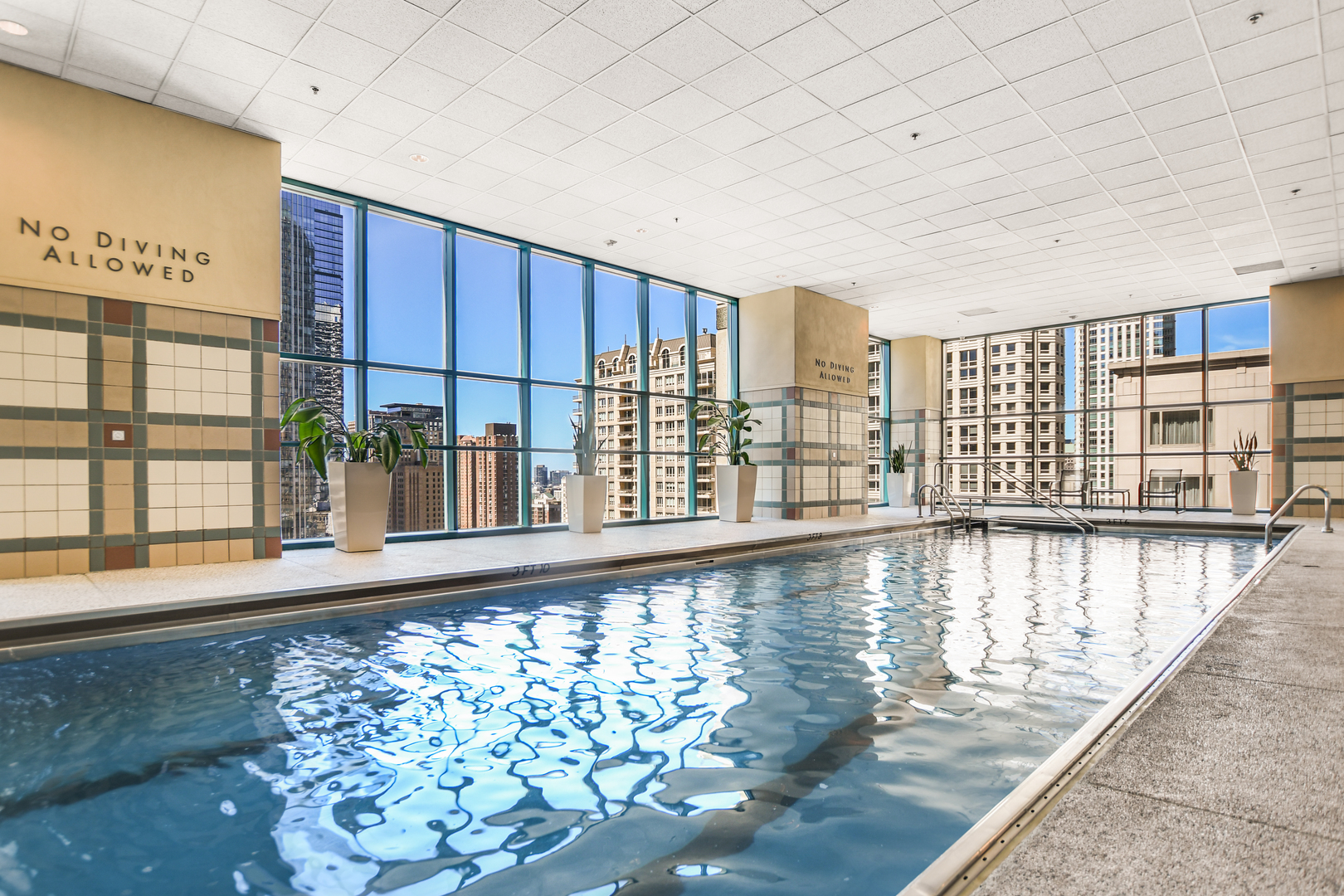100 East Huron Street, Unit 4002 Chicago, IL 60611 - Photo 43 of 49 a view of a large window with swimming pool in front of it