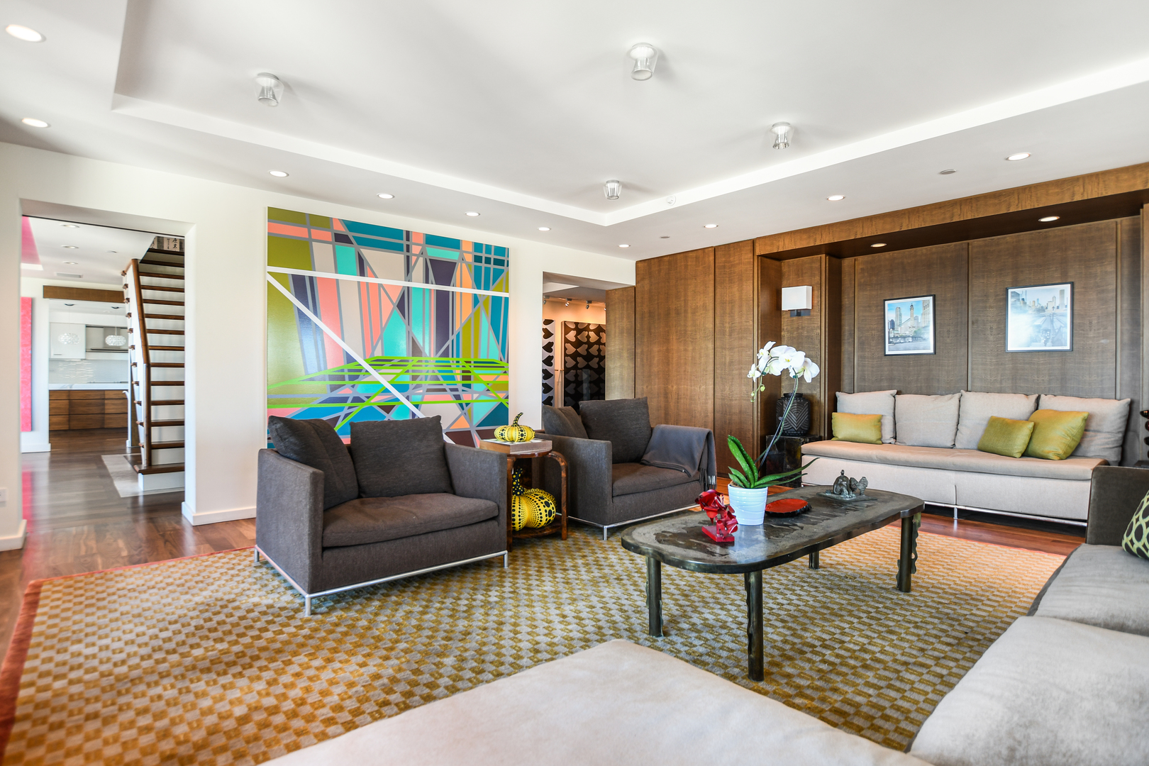 100 East Huron Street, Unit 4002 Chicago, IL 60611 - Photo 7 of 49 a living room with furniture and wooden floor