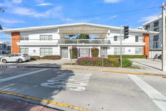 a front view of a building with street view