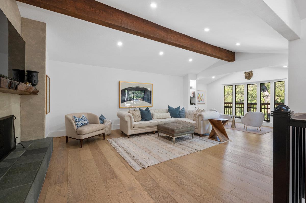 27 Oakwood Road Orinda, CA 94563 - Photo 12 of 61 a living room with furniture and a fireplace
