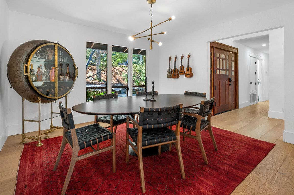 27 Oakwood Road Orinda, CA 94563 - Photo 16 of 61 a dining room with furniture and wooden floor