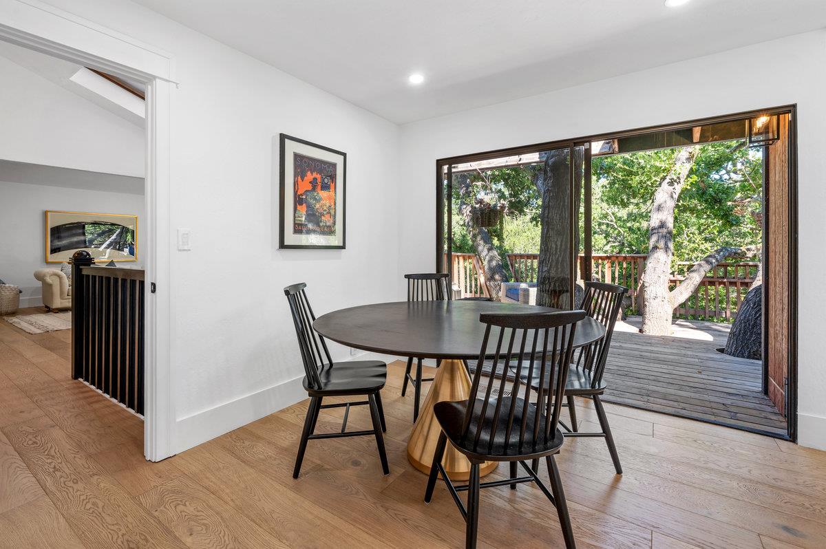 27 Oakwood Road Orinda, CA 94563 - Photo 17 of 61 a view of a dining room with furniture window and wooden floor