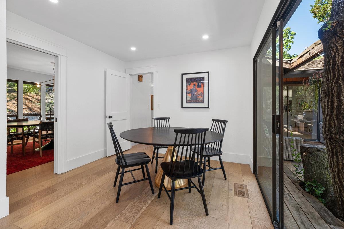 27 Oakwood Road Orinda, CA 94563 - Photo 18 of 61 a view of a dining room with furniture and wooden floor