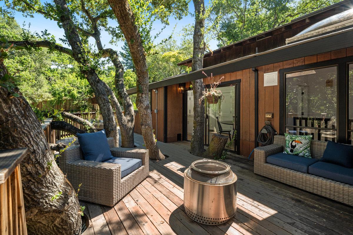 27 Oakwood Road Orinda, CA 94563 - Photo 28 of 61 a view of a patio with couches table and chairs and potted plants