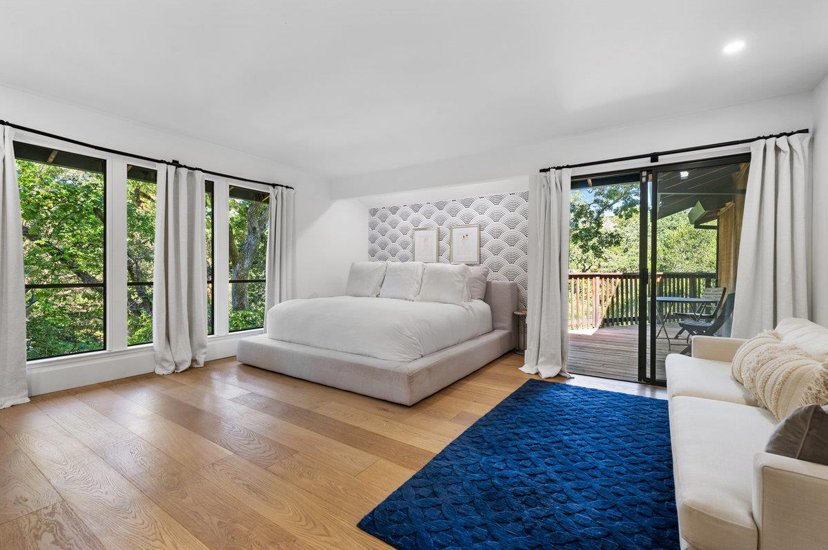 27 Oakwood Road Orinda, CA 94563 - Photo 29 of 61 a bedroom with a large bed and a large window